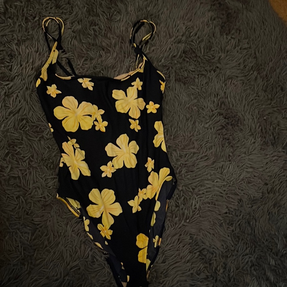 Super cute one piece bathing suit.  Size large.